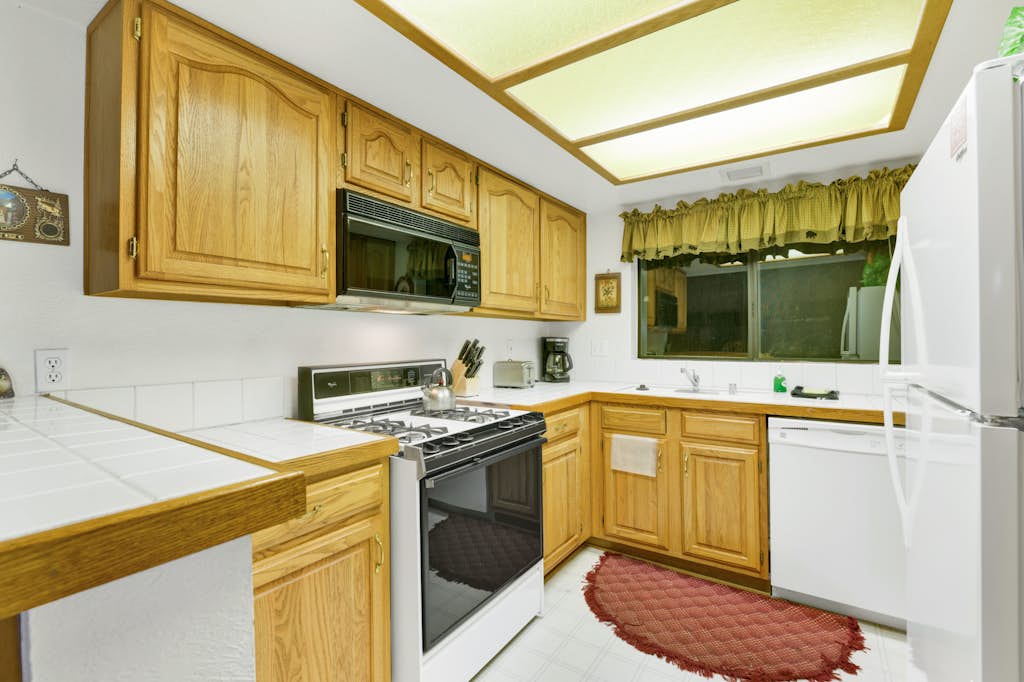 Modern 2BR/2.5BA Resort Condo: Attached Garage, Pond Views & Steps to Resort