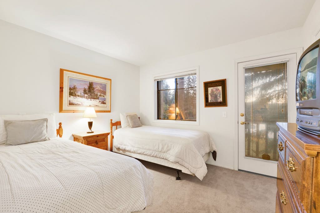 Modern 2BR/2.5BA Resort Condo: Attached Garage, Pond Views & Steps to Resort