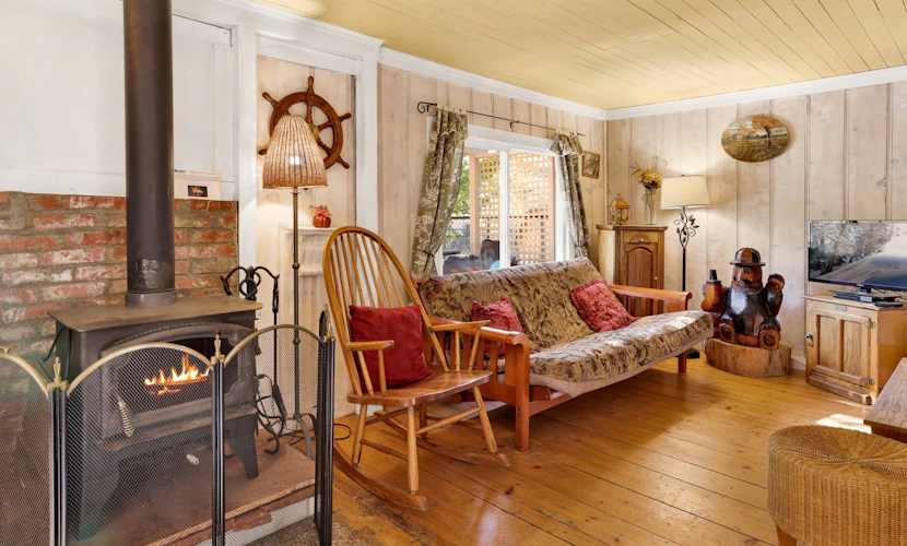 Pines 23 | Cozy Village Retreat w/ Forest Views, Fireplace & Walk-to-Lake