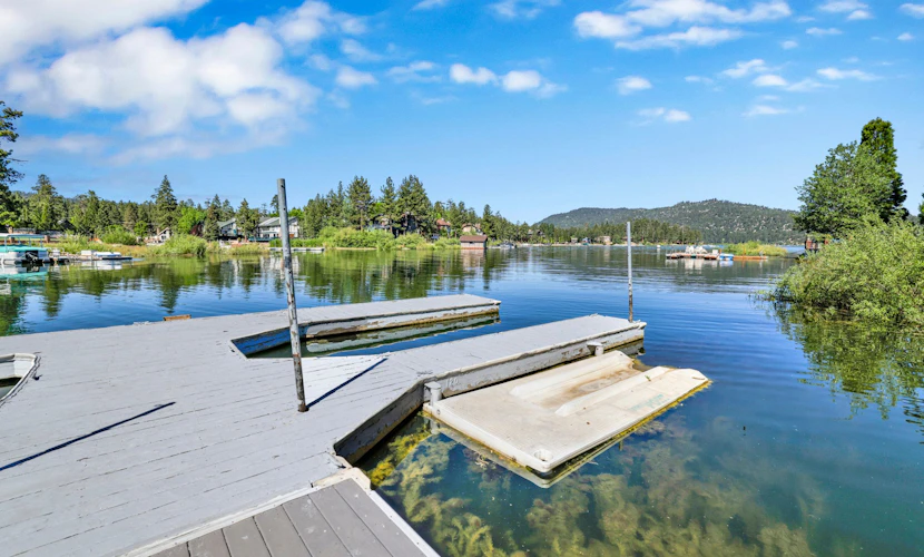 7BR/6.5BA Lakefront Estate: Private Boat Dock, Wood Fireplace & Village Access