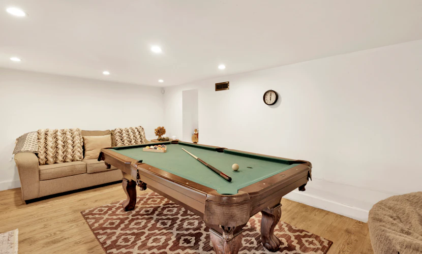 Hot Tub • Game Room • Central Location • Three-Level Mountain Retreat