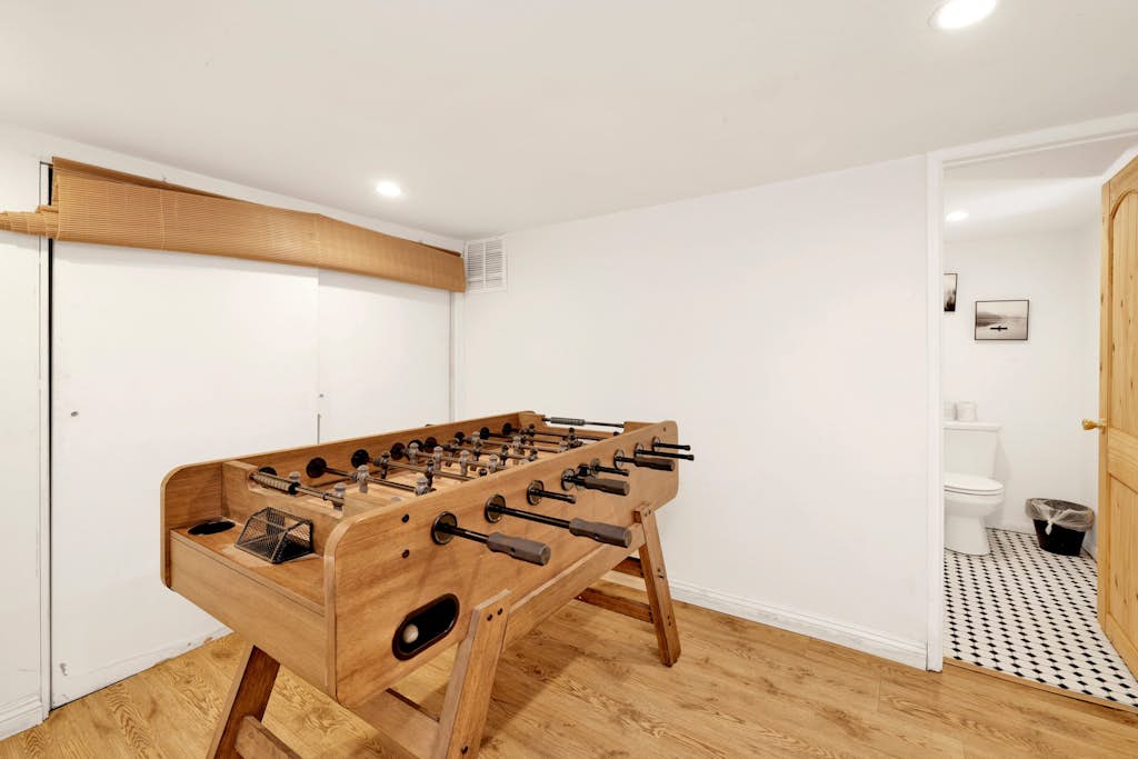 Hot Tub • Game Room • Central Location • Three-Level Mountain Retreat