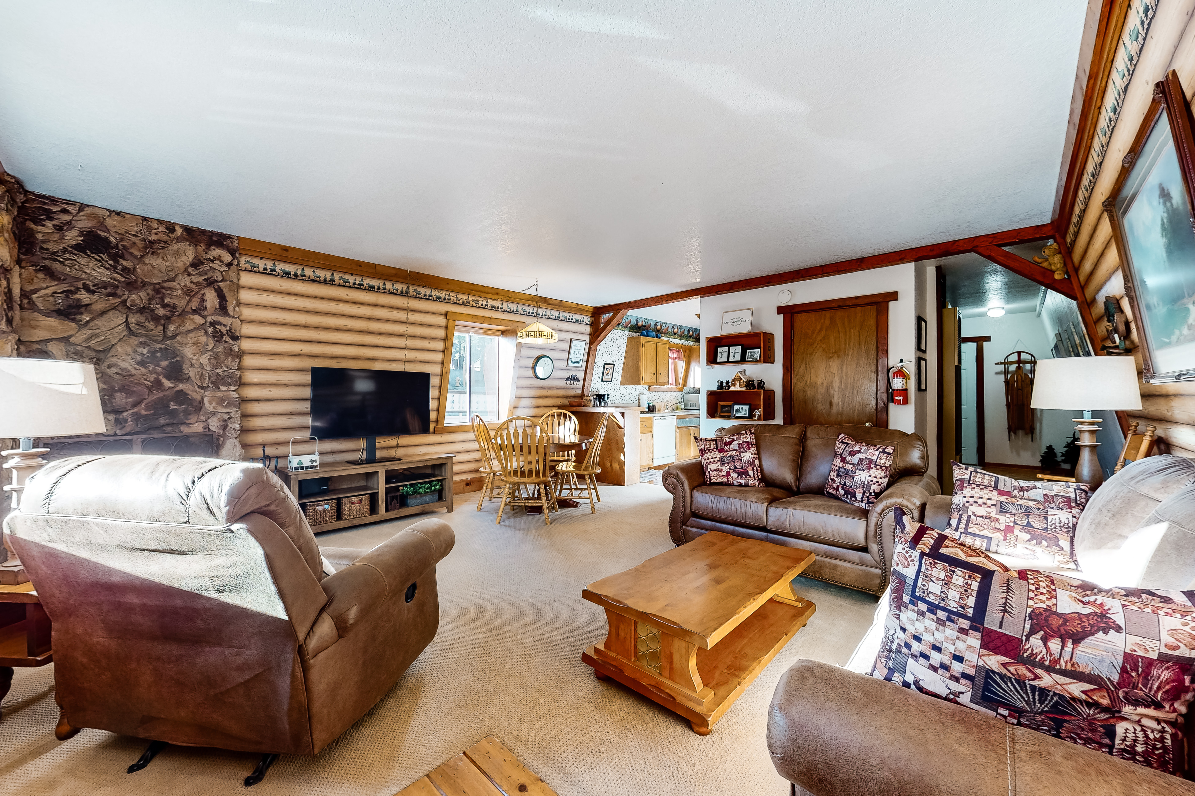 Lazy Bear Barn - A Cozy Red Cabin Mountain View Cabin with Wi-Fi, Fireplace, & Deck