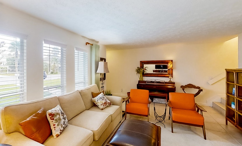 Two-story condo with pool, tennis & patio - 2 short blocks to the beach