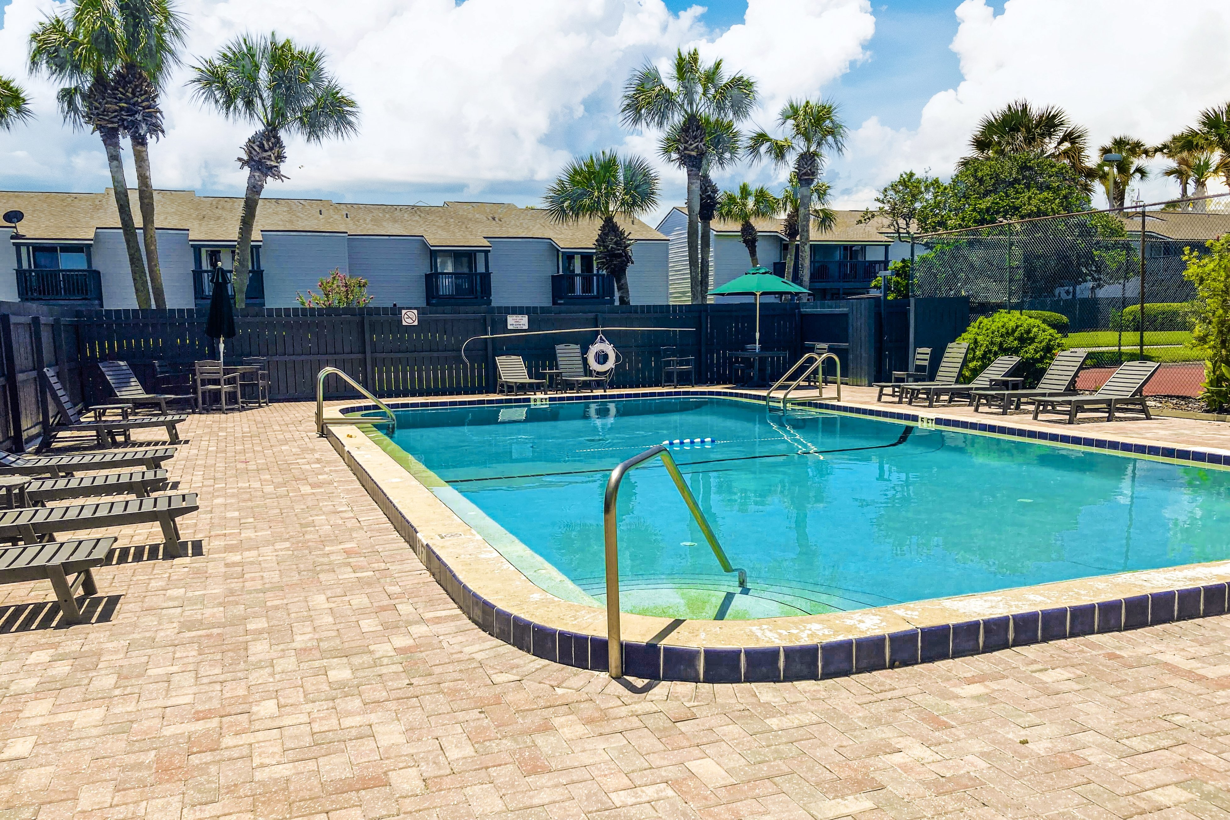 Two-story condo with pool, tennis & patio - 2 short blocks to the beach