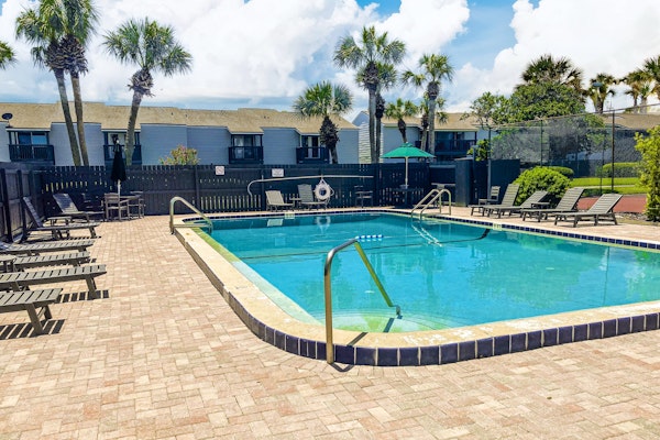 Two-story condo with pool, tennis & patio - 2 short blocks to the beach