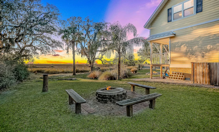 Inviting waterfront cottage w separate garage apartment and stunning marsh view