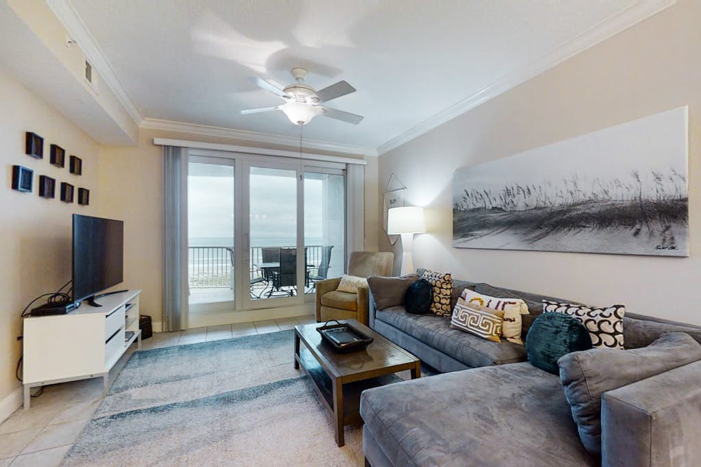 Elegant, oceanfront condo with balcony, washer/dryer & on-site pool