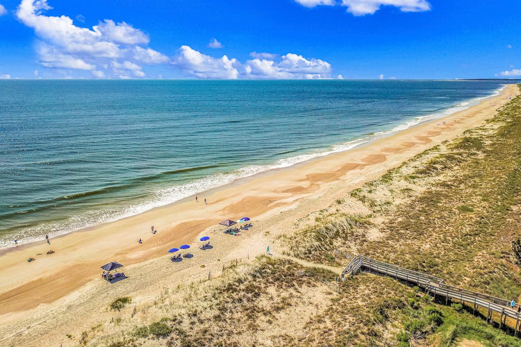 Elegant ocean-view townhome with beach access & pool - perfect location
