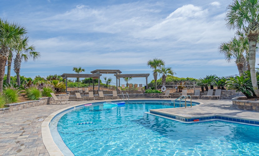 Cozy condo with balcony, garden views and beach access