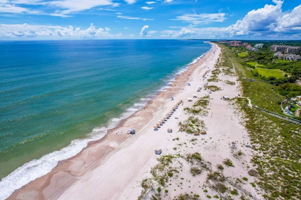 Cozy condo with balcony, garden views and beach access