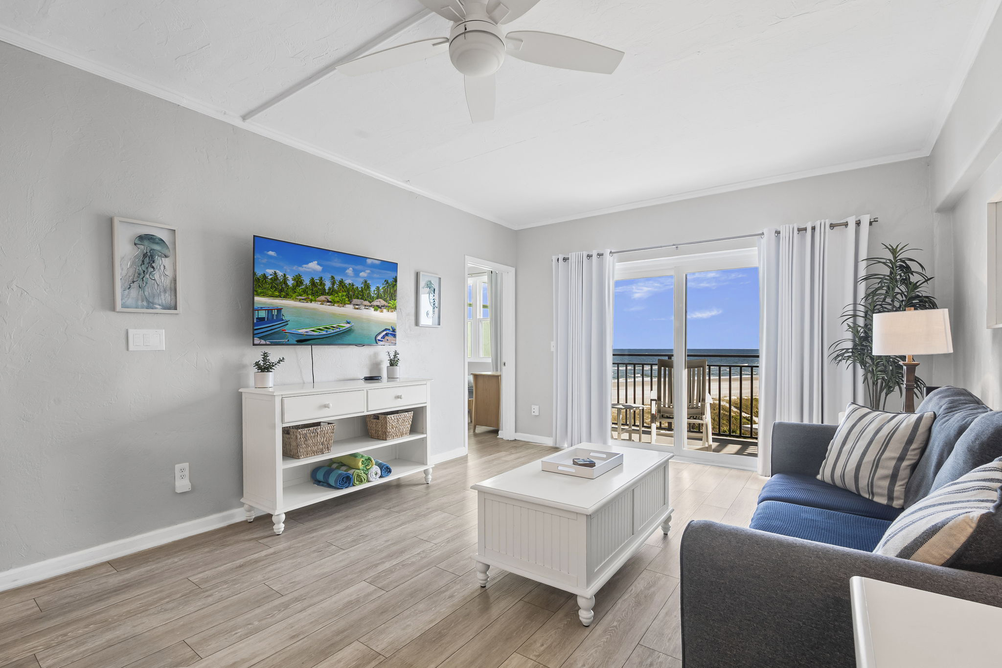 Polished oceanfront condo with pool access, private balcony & washer/dryer