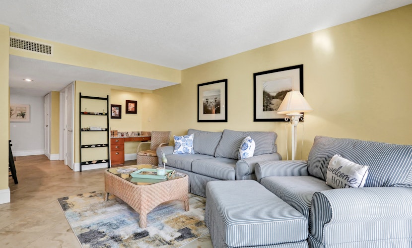 Oceanfront condo with direct beach access, pool, balcony, grilling area, & AC