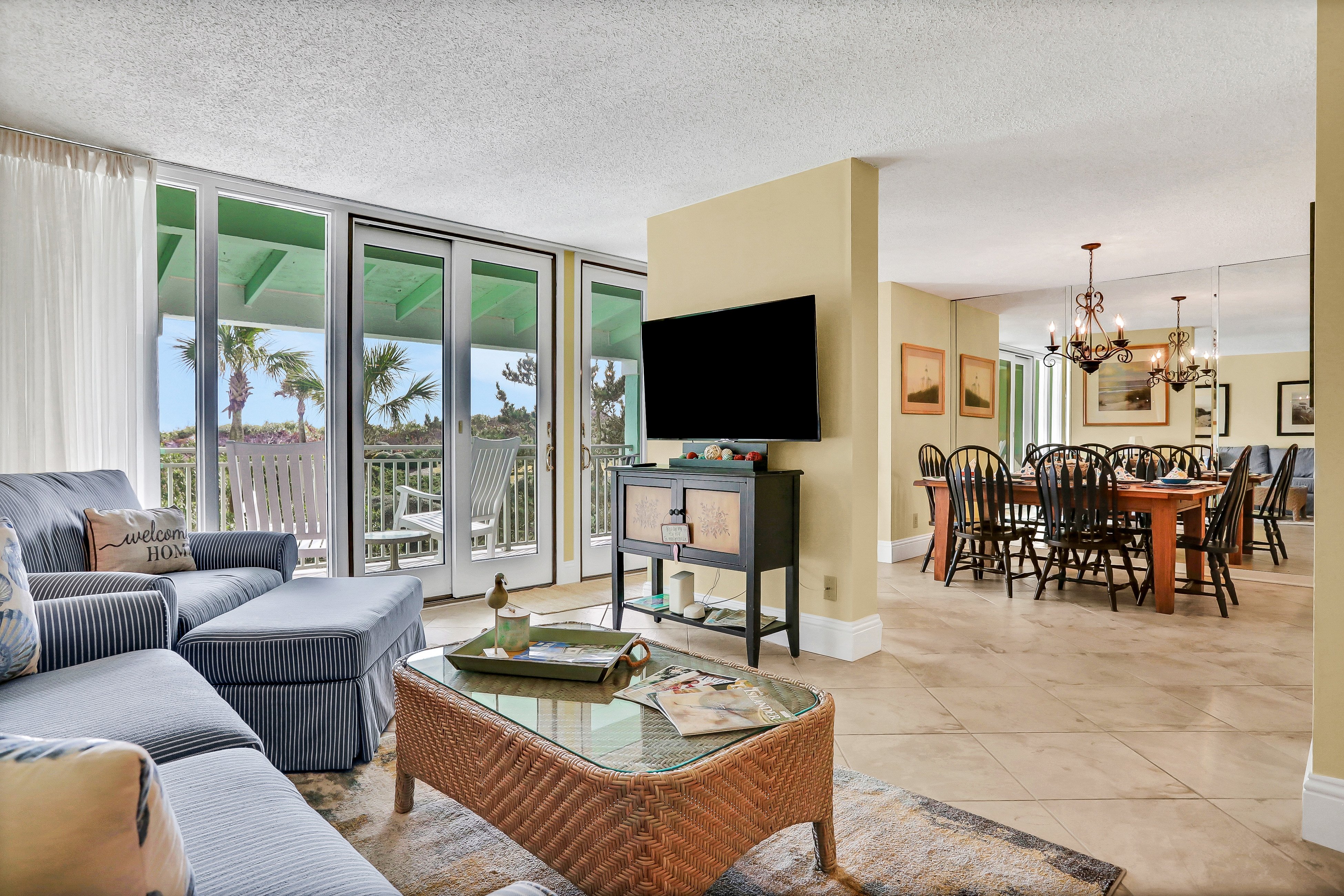 Oceanfront condo with direct beach access, pool, balcony, grilling area, & AC
