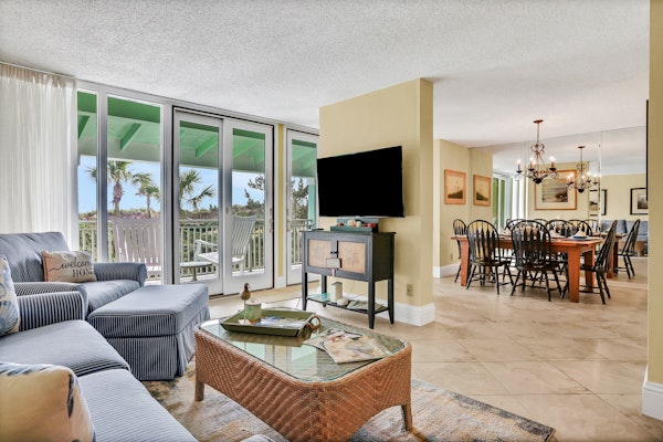 Oceanfront condo with direct beach access, pool, balcony, grilling area, & AC