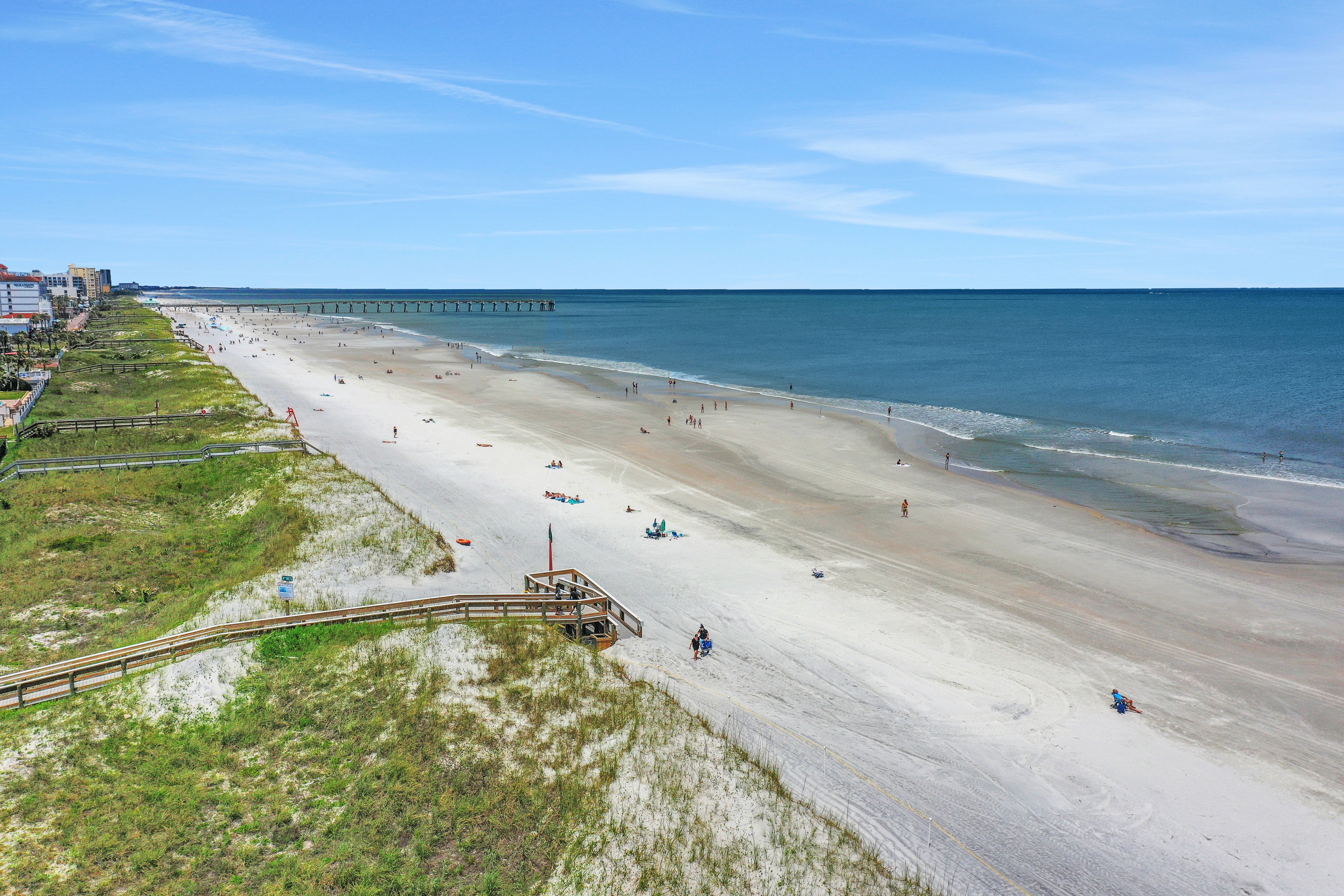 Renovated condo with ocean views, pool, & beach access