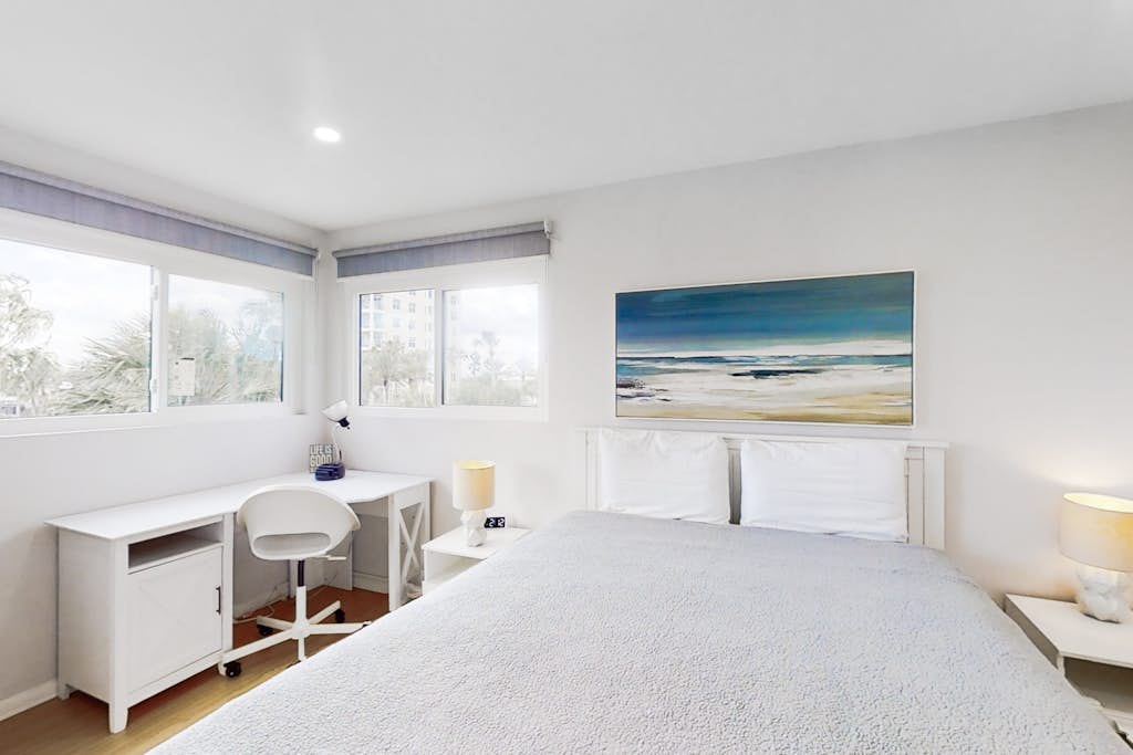 Renovated condo with ocean views, pool, & beach access