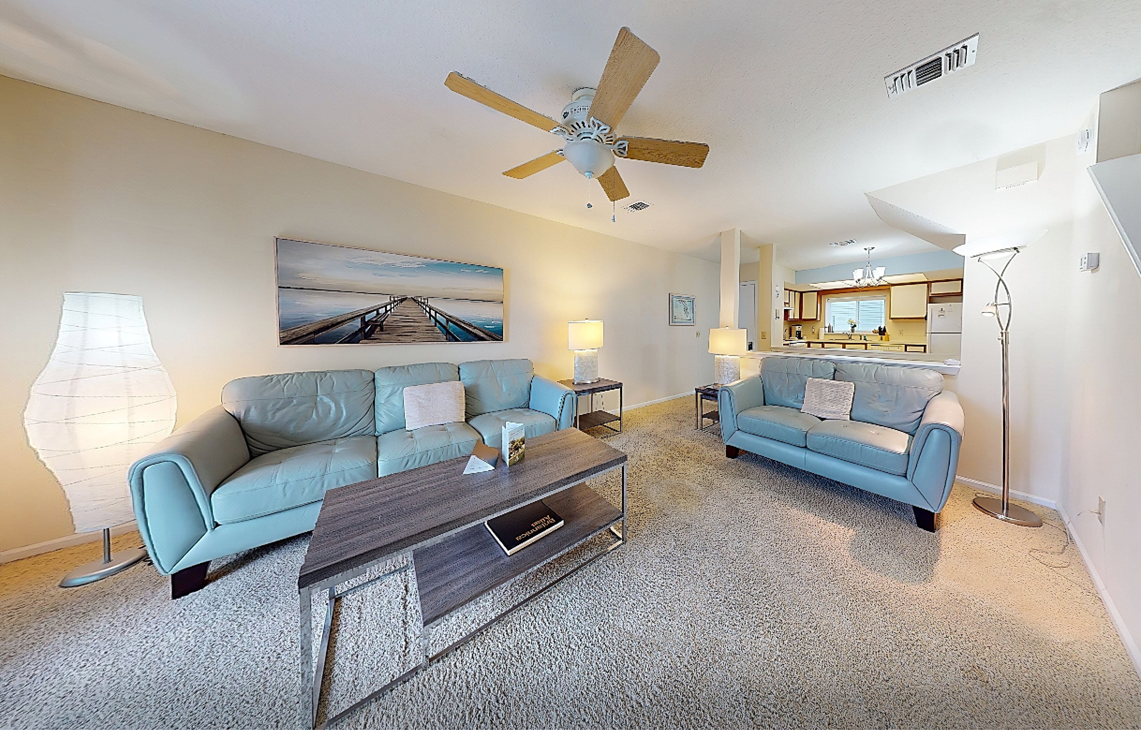 Ocean-view townhome with balcony & W/D - walk to beach - dog-friendly