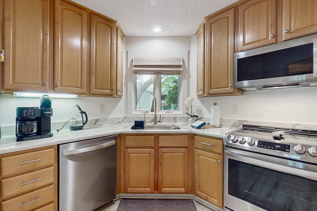 Ameila Island Plantation condo with private patio, resort amenities and pool.