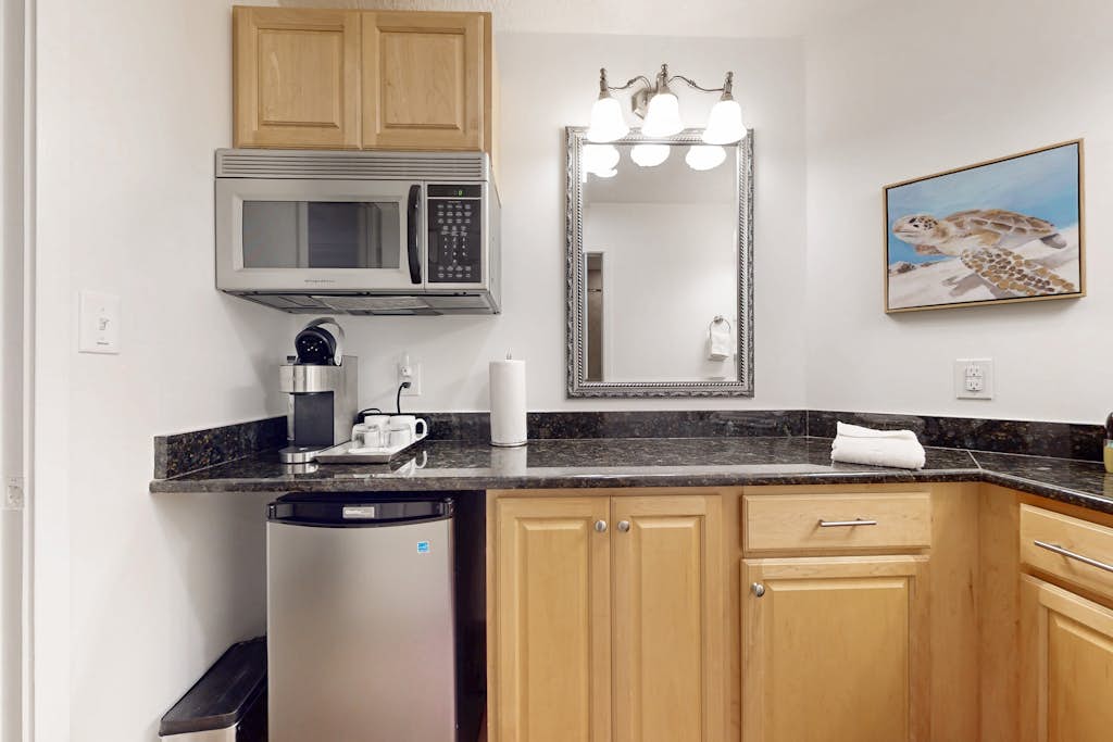 Ameila Island Plantation condo with beach access, private patio and pool.