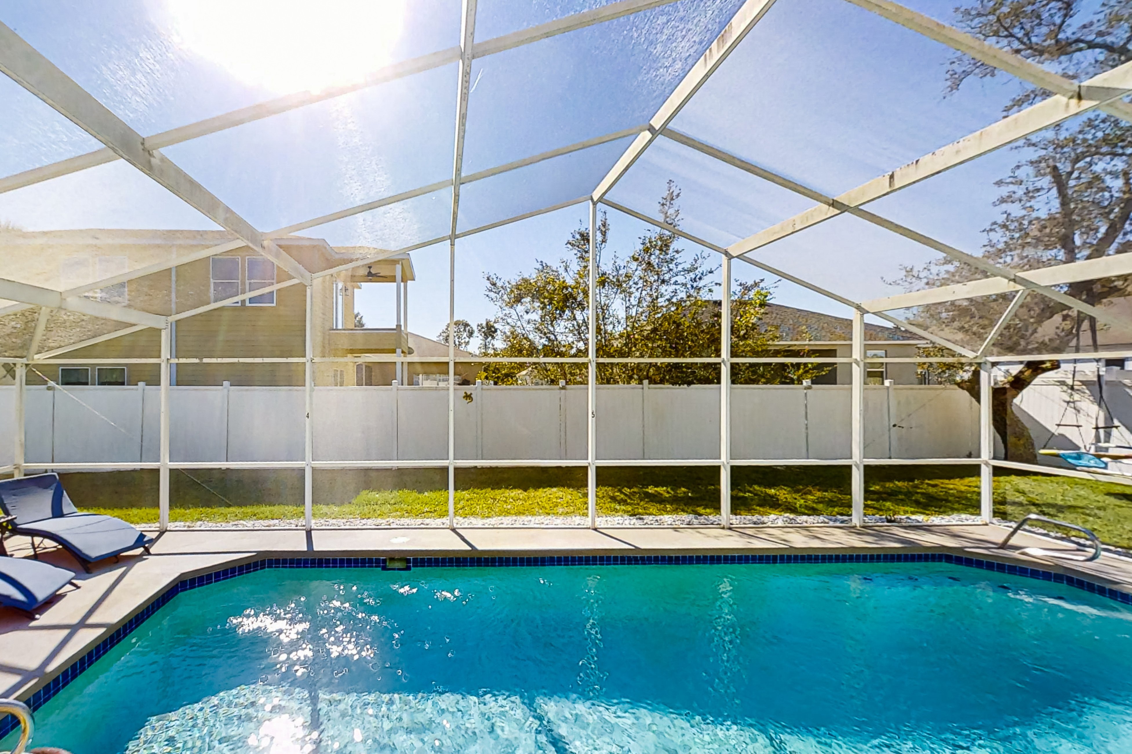 Pristine Palms | House in Palm Coast with enclosed pool & full kitchen