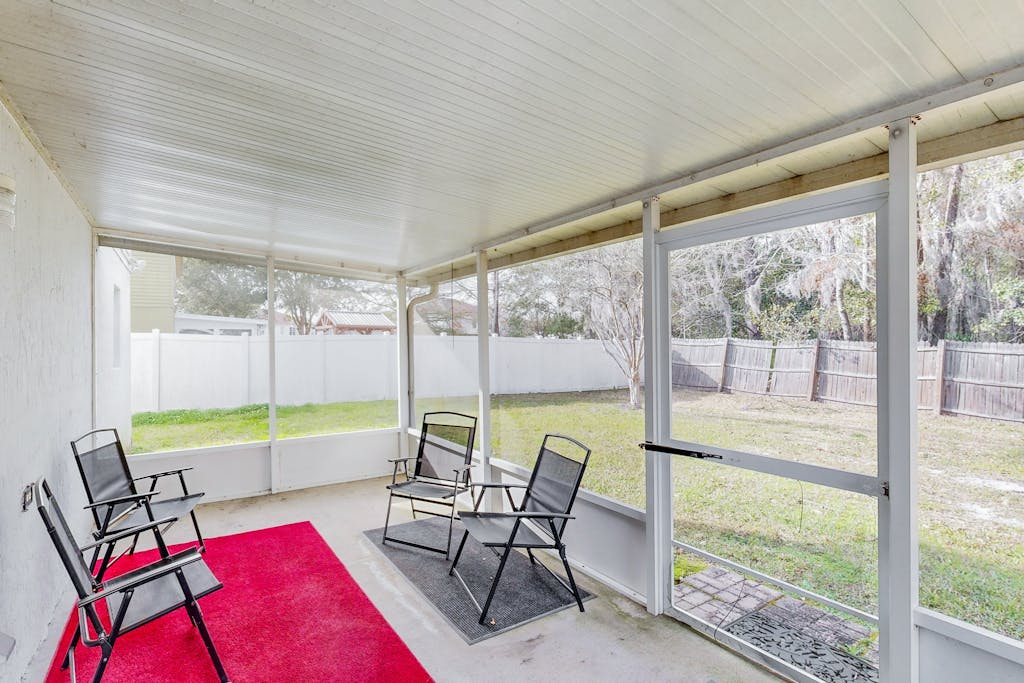 Royal Retreat with enclosed yard and screened in back patio