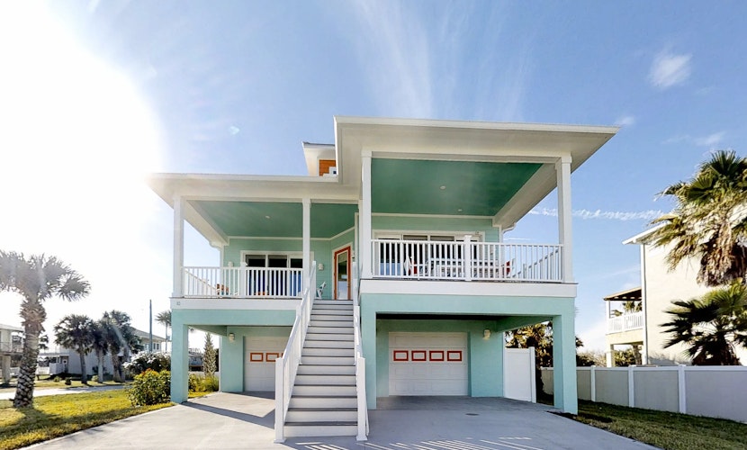 Stylish brand-new ocean view home with deck & porch - steps to beach