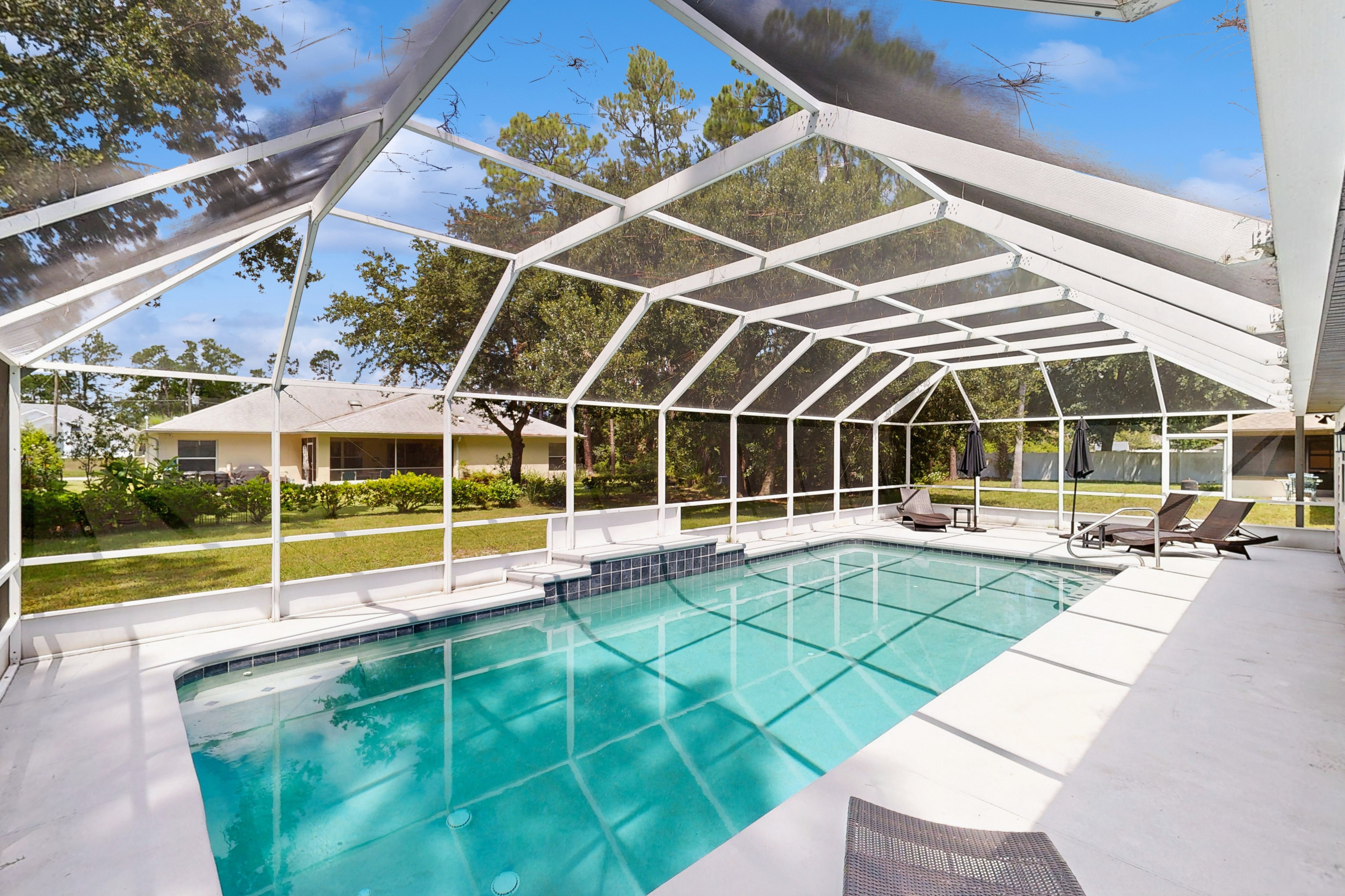 Home near the beach with private pool, inviting patio, streaming & AC