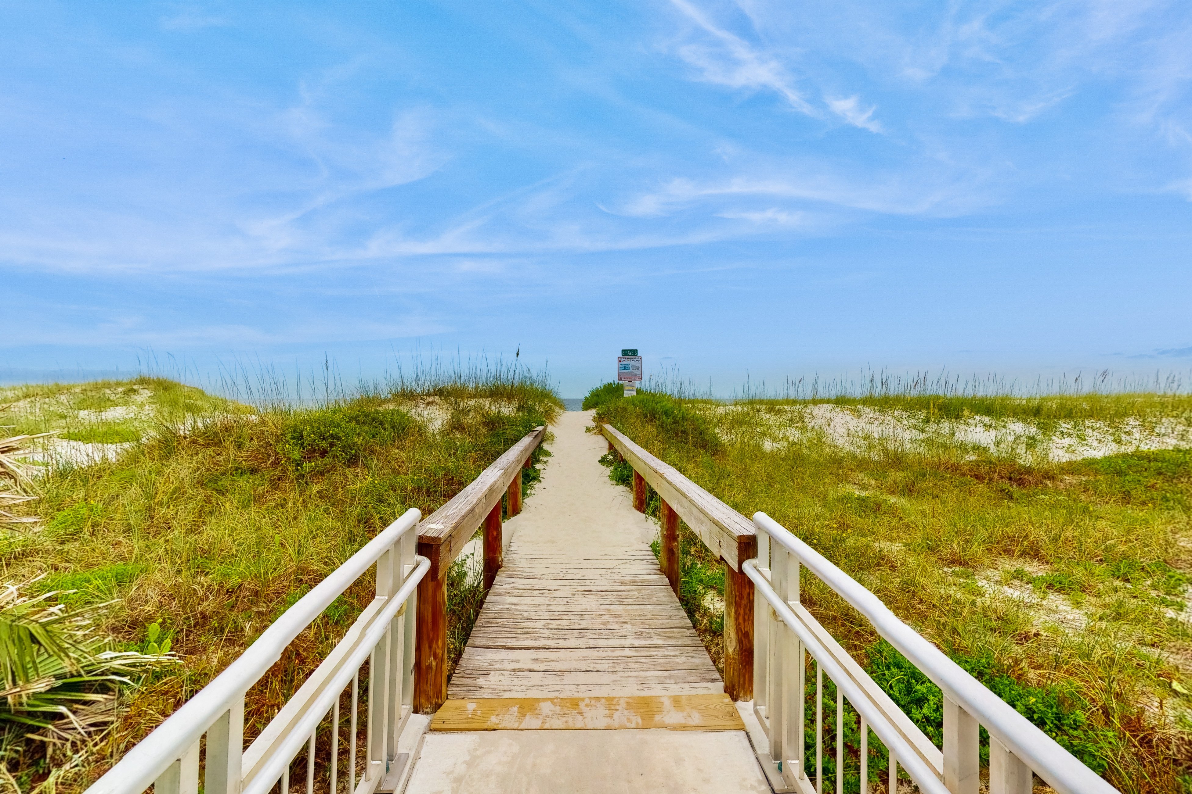 Modern oceanfront condo with outdoor pool, balcony, & washer/dryer
