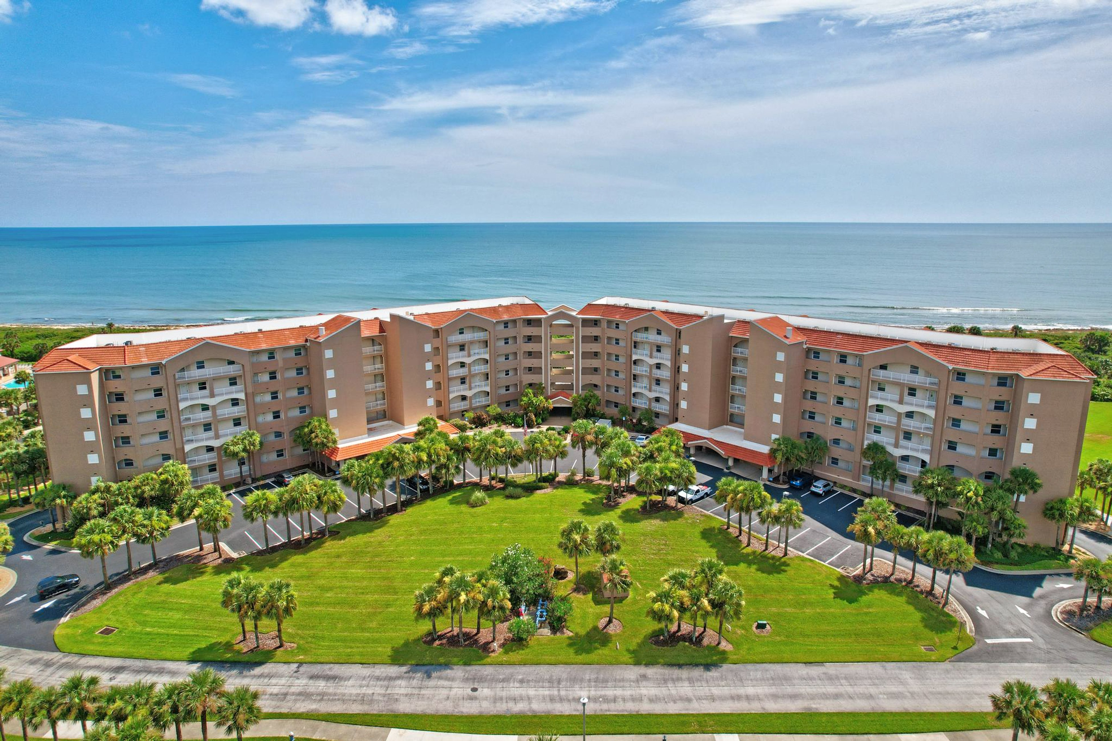 Oceanfront condo with large patio, direct water access, pool, central AC, & W/D