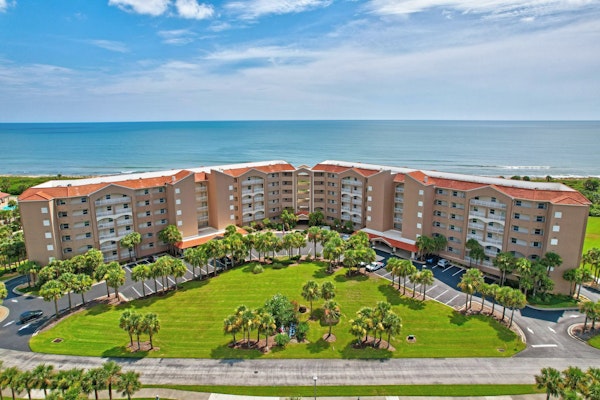 Oceanfront condo with large patio, direct water access, pool, central AC, & W/D