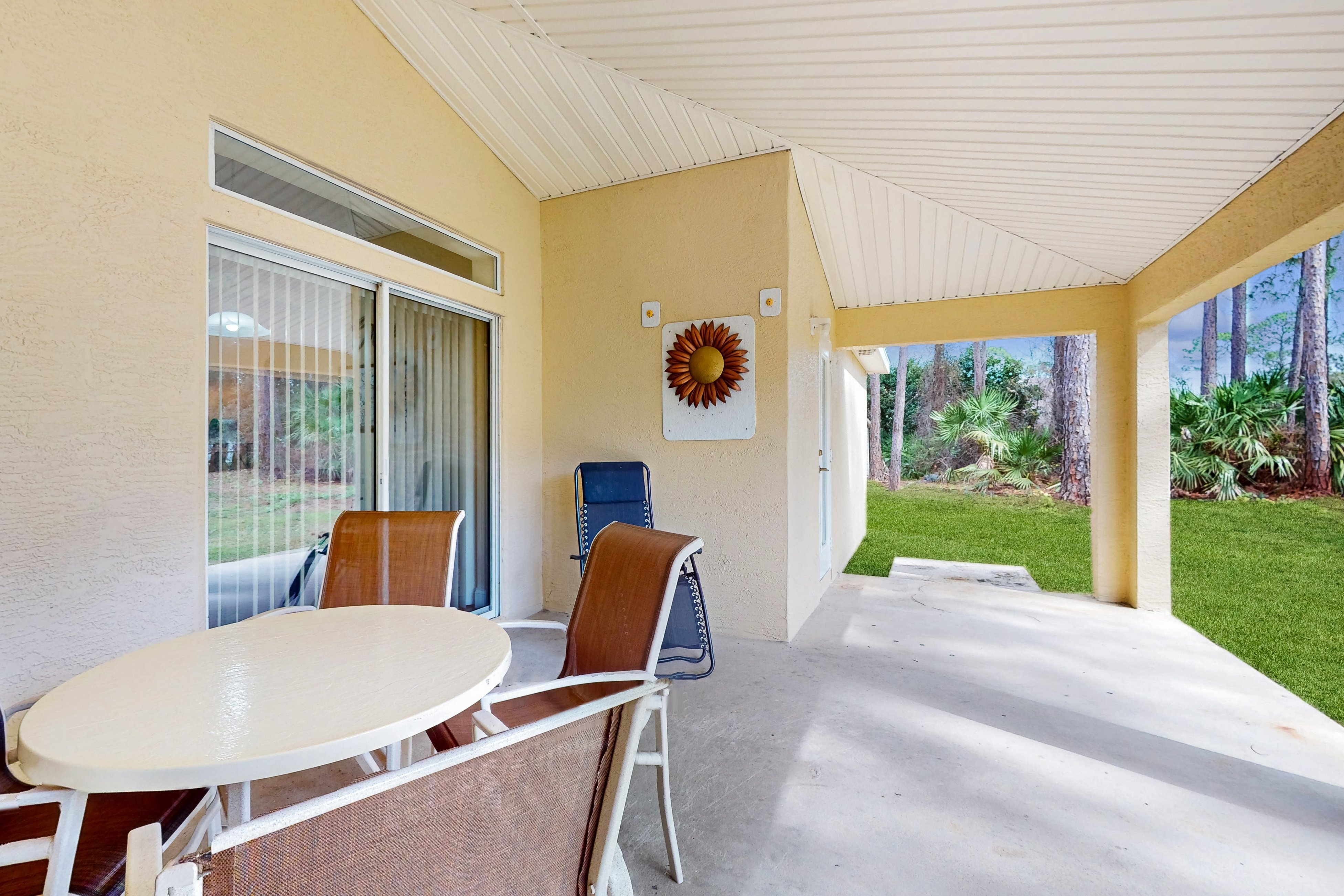 Luxury home with open layout, smart TVs, patio, & alfresco dining