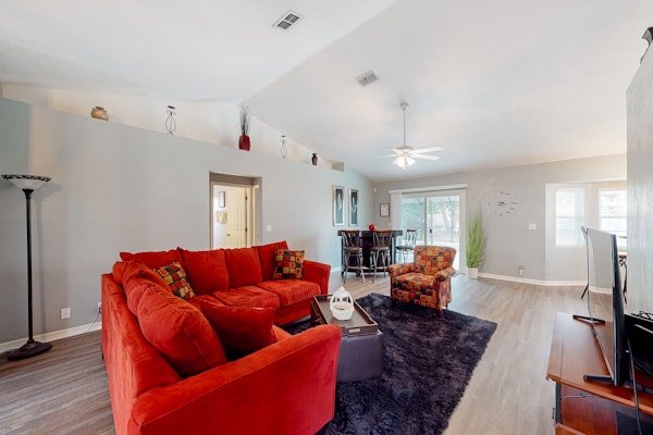 Spacious home with enclosed pool, open layout, washer/dryer, internet, & AC