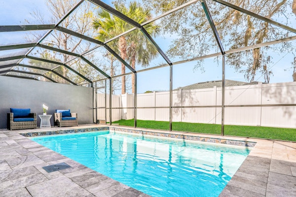 Brand-new duplex with screened pool, furnished lanai, grill, AC, & washer/dryer