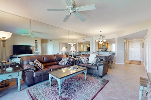 Oceanfront condo with panoramic views, shared pool, and private washer & dryer