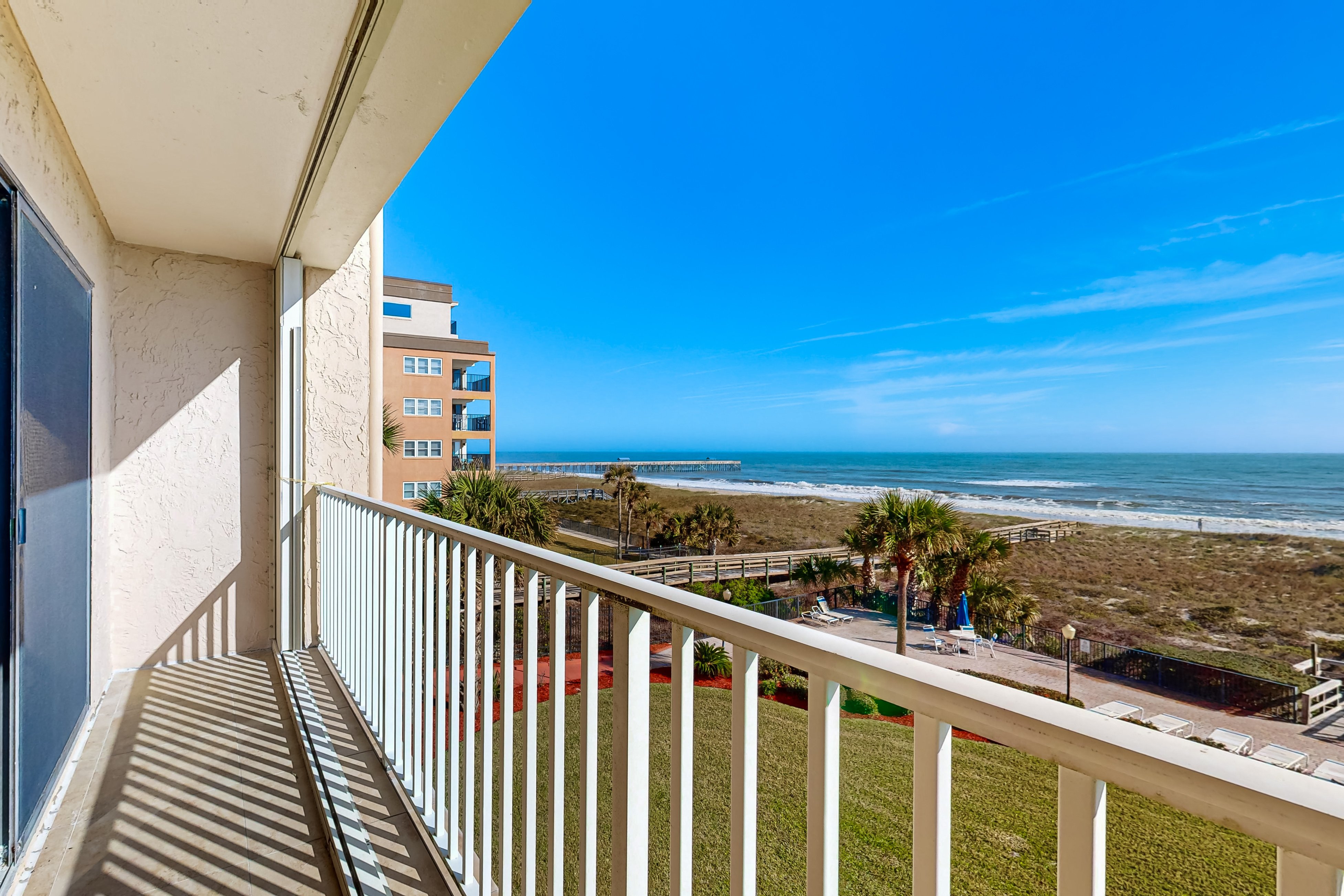 Oceanfront condo with private balcony, shared pool and beach access