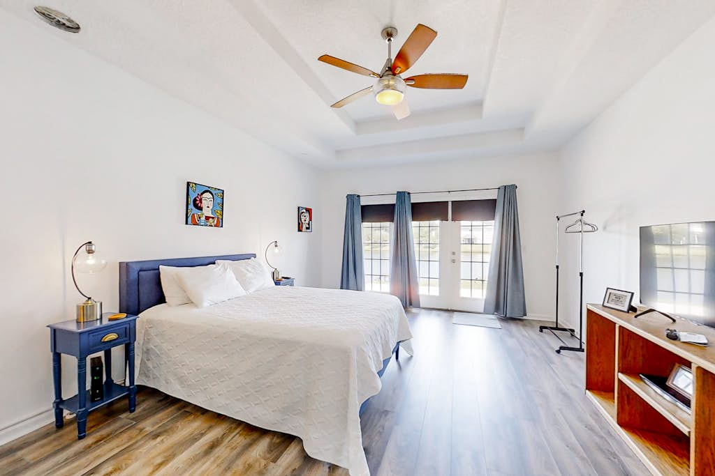 Waterfront 2-story home with water views, patio, streaming, washer/dryer, & AC
