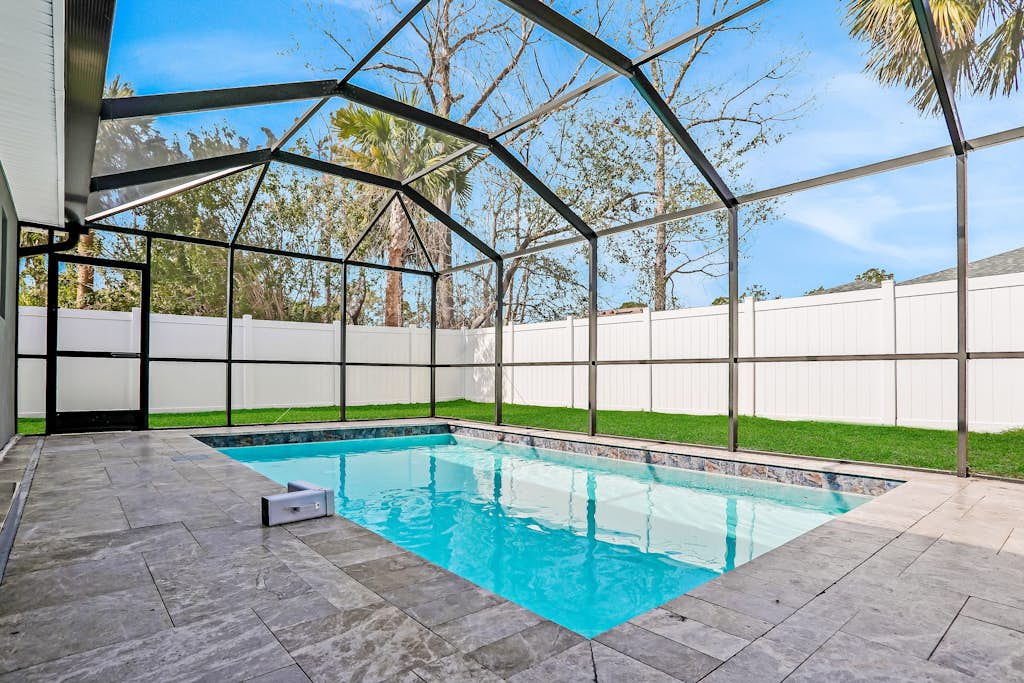 All-new duplex with screened pool, furnished lanai, grill, AC, & washer/dryer
