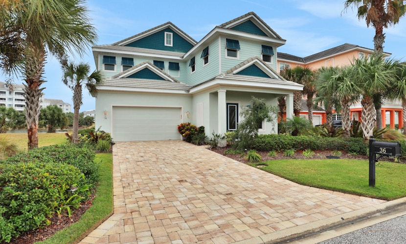 Palm-surrounded stunner with enclosed pool & water views - dog-friendly