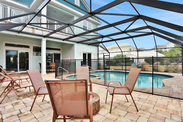 Palm-surrounded stunner with enclosed pool & water views - dog-friendly