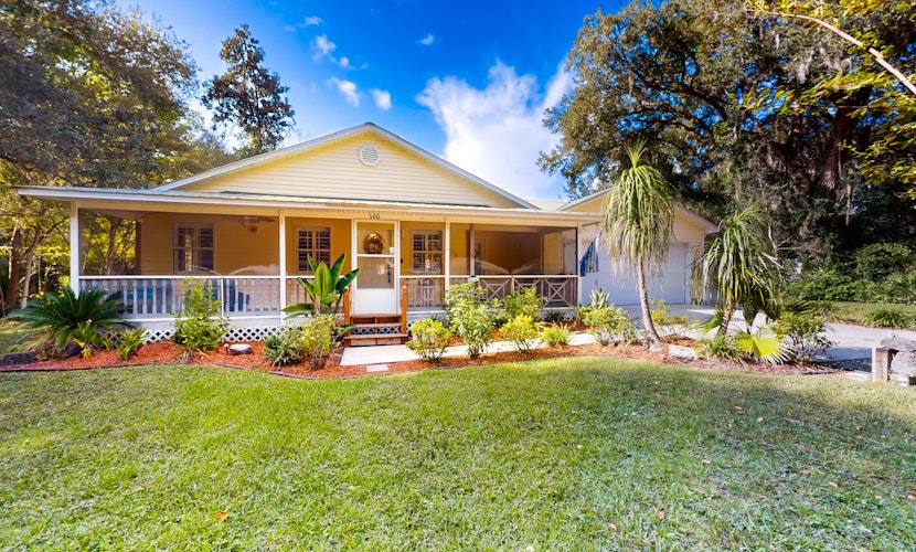 Serene home with enclosed yard, grill, games, & central AC - dog-friendly