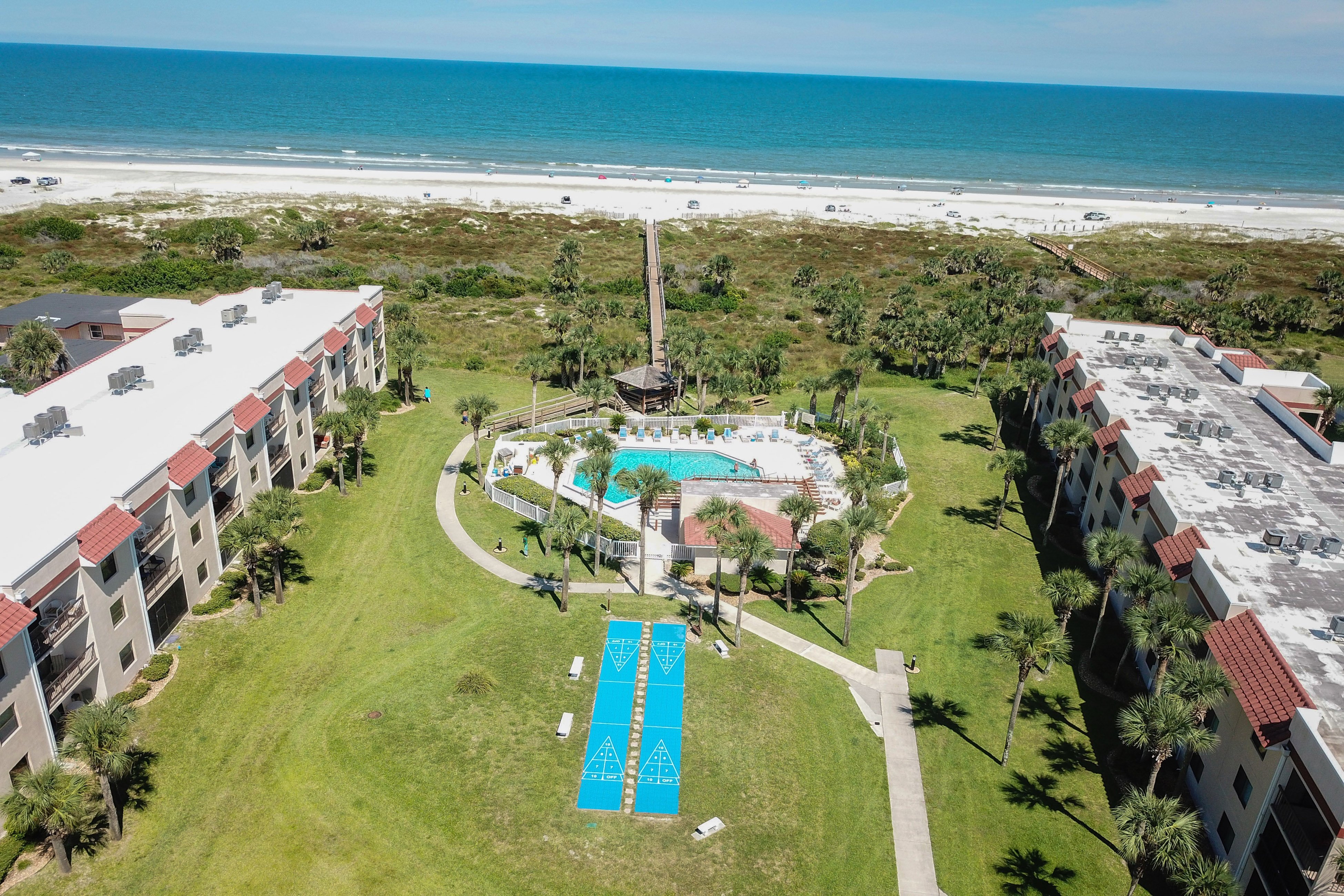 Sun-kissed beach condo with amazing pool, tennis & patio - Steps to the beach!