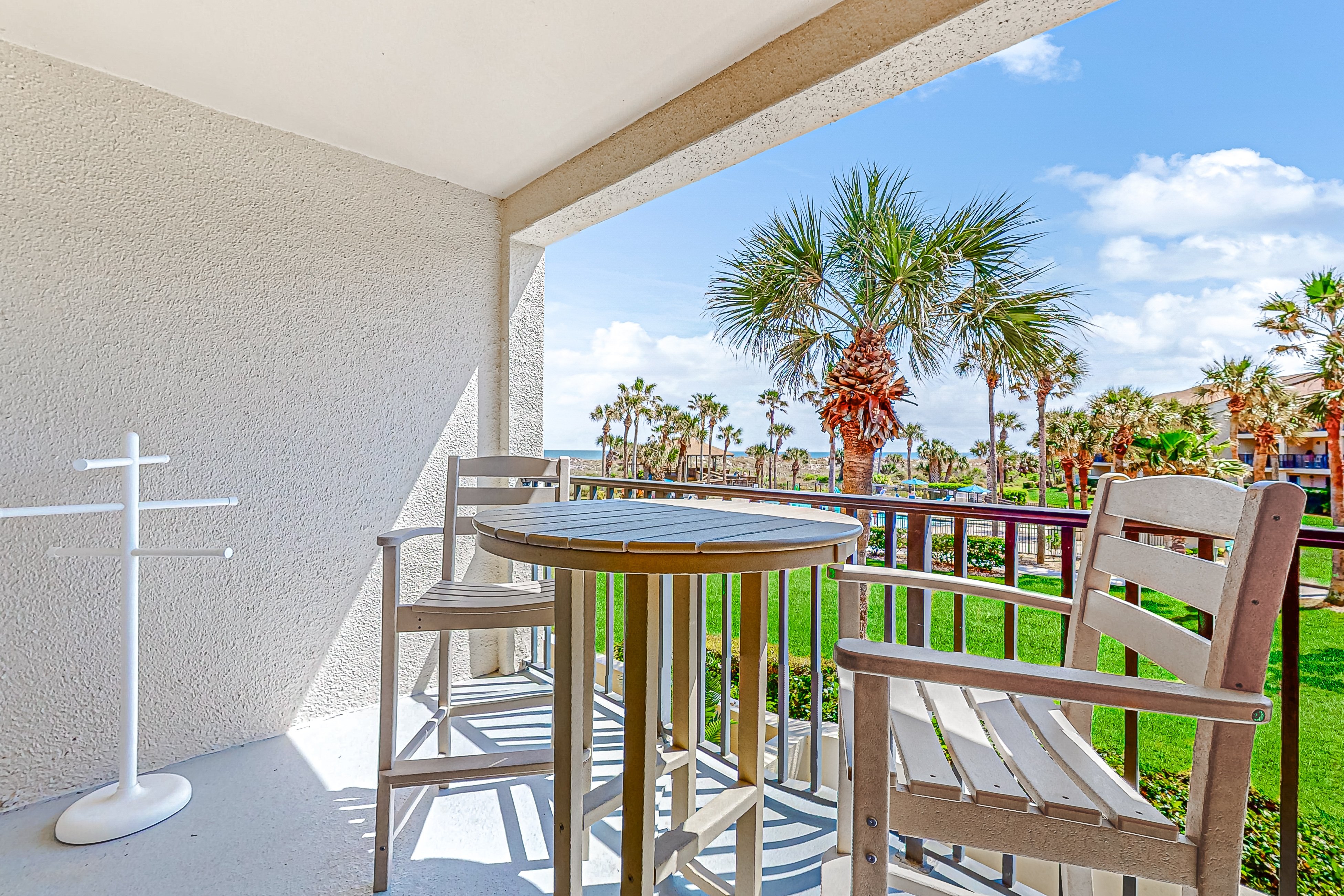 Recently updated resort condo with 2 pools, 2 balconies, ocean views, BBQ, & W/D