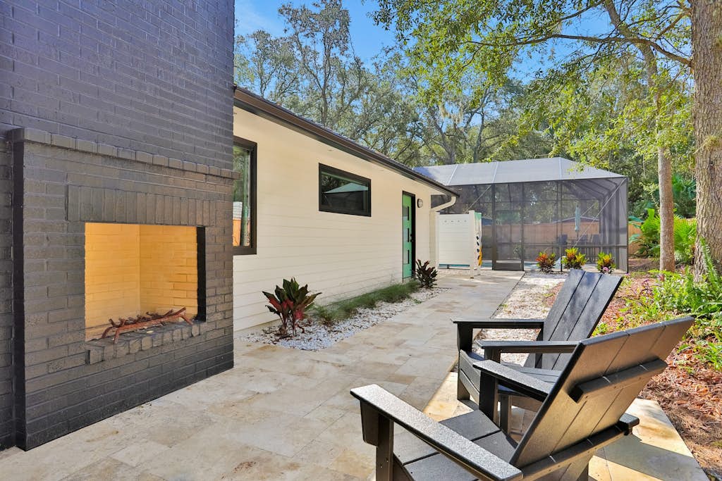 Renovated home with private pool, patio, outdoor fireplace, & grill