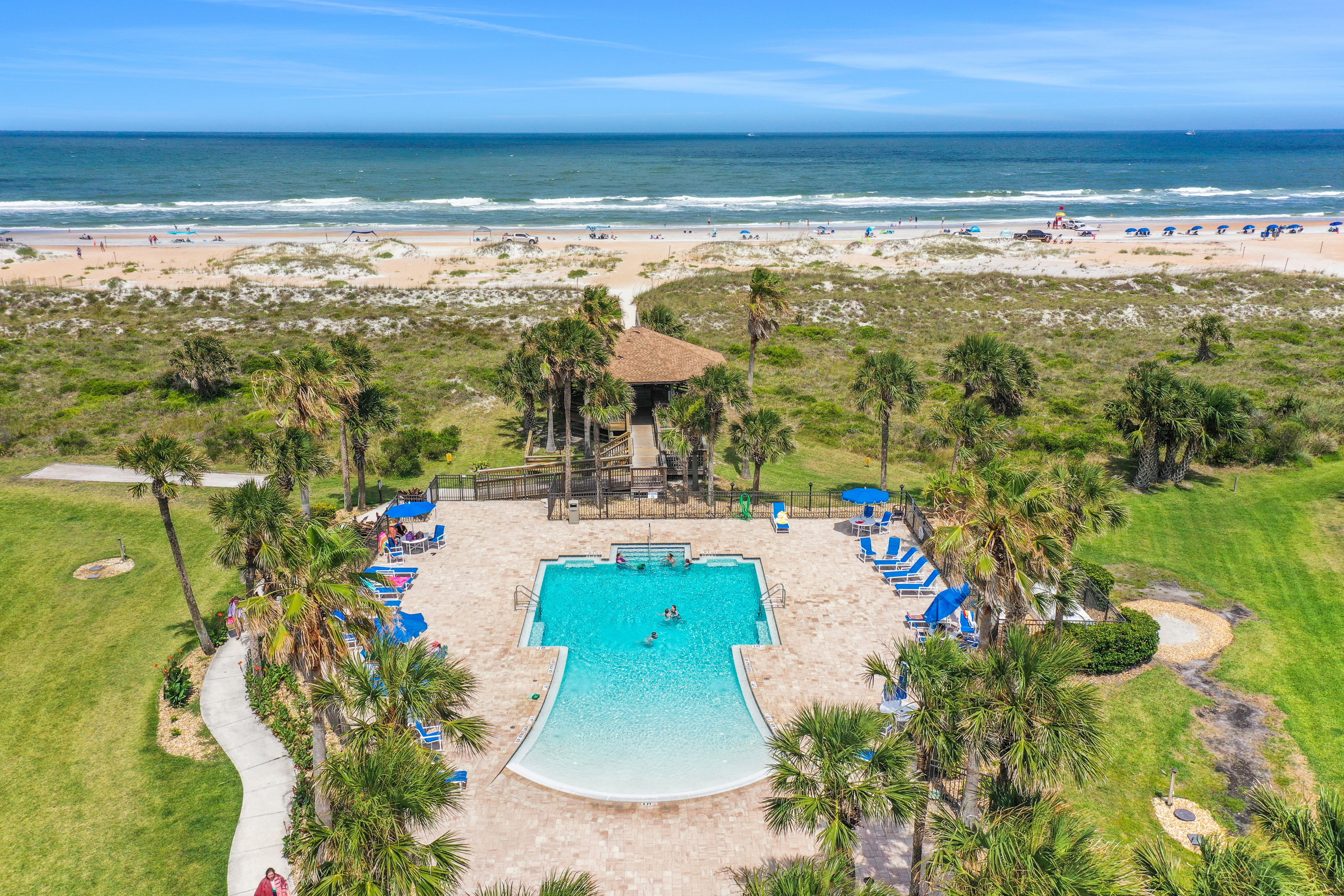 Ocean-view condo with 2 pools, beach access & private lanais