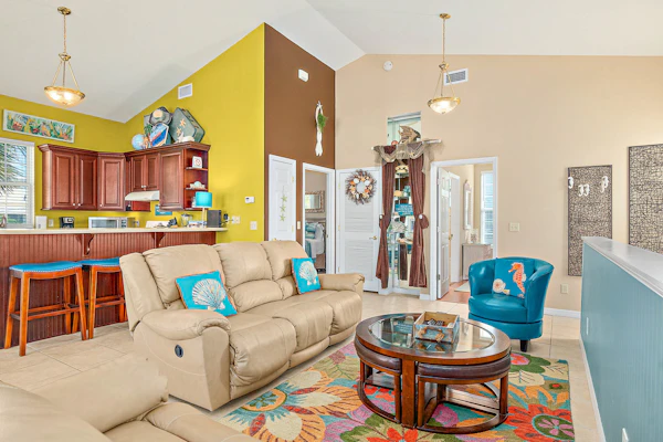 Two-level home with partial ocean view, balcony, WiFi, & W/D - walk to the beach