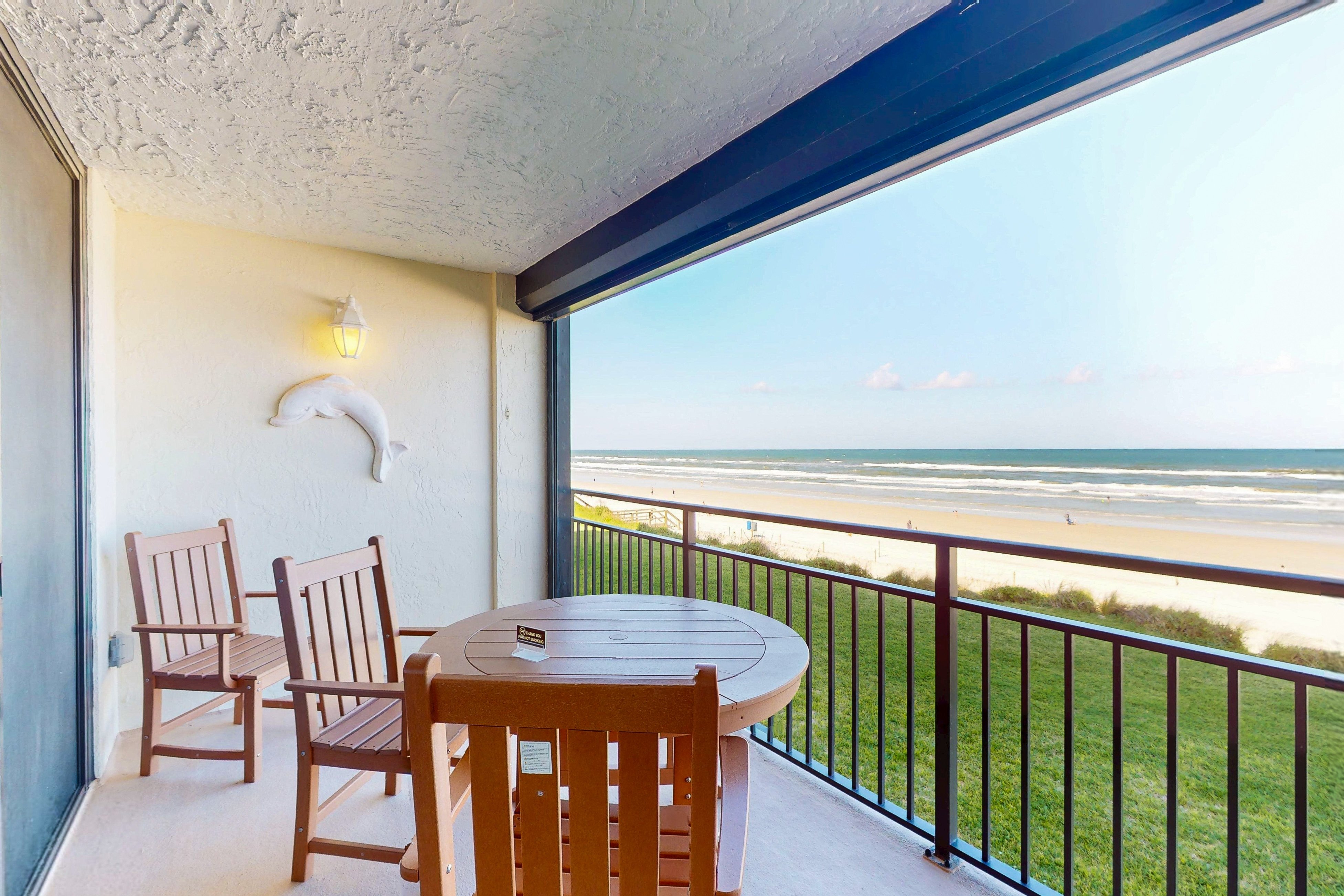 Oceanfront condo with pool, ocean views, and washer/dryer