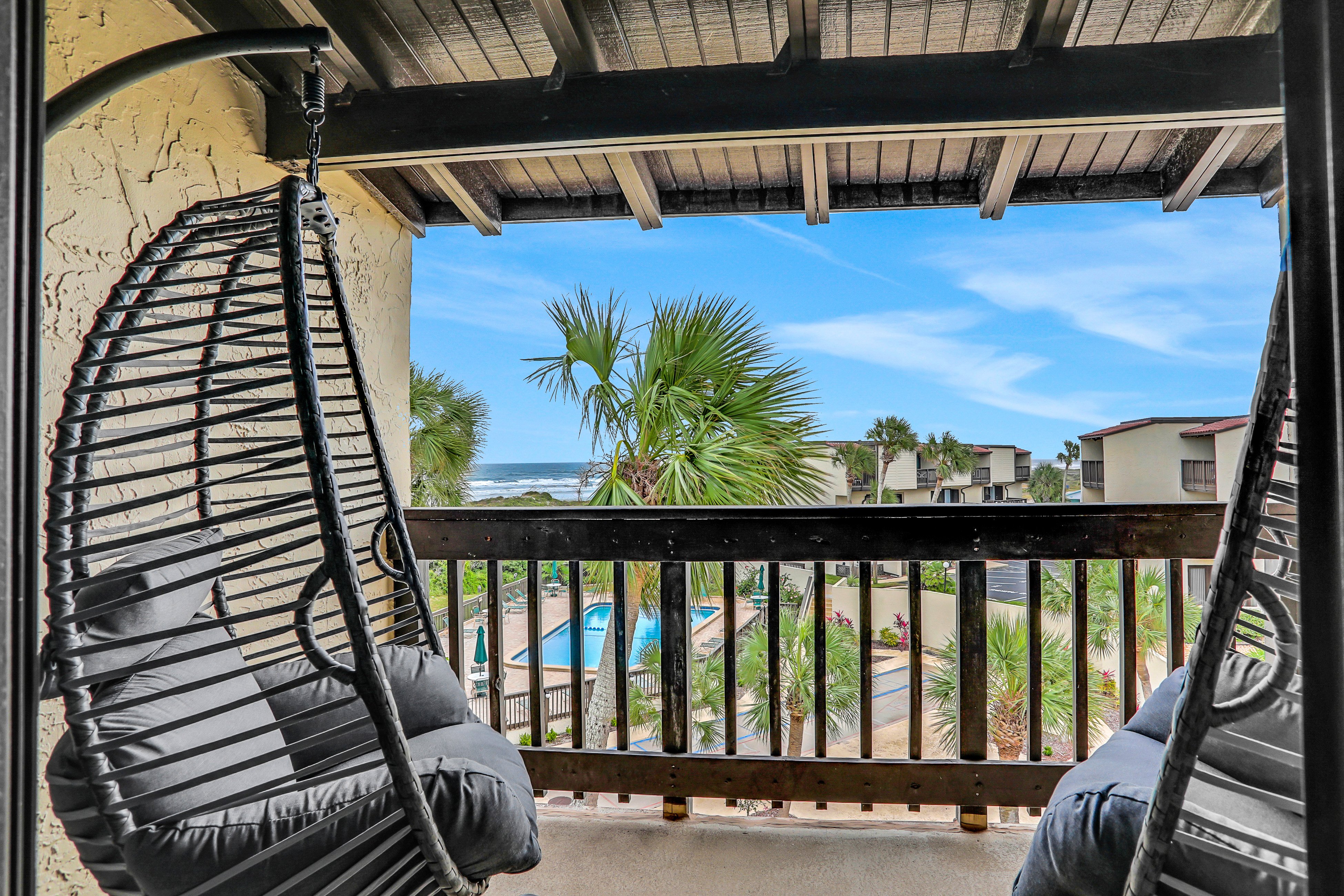 Modern oceanview condo with multiple balconies, pool & W/D - beach access