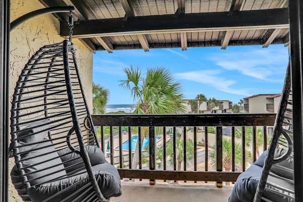 Modern oceanview condo with multiple balconies, pool & W/D - beach access