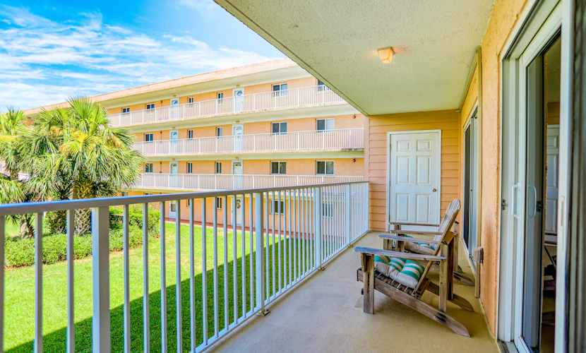 Ocean view condo in beachfront resort with WiFi, central AC, 2 pools, & tennis